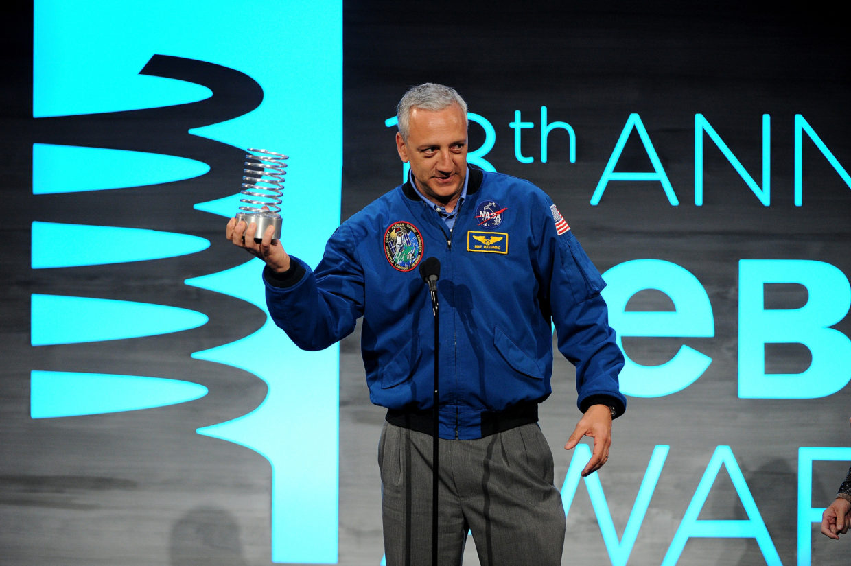 Astronaut Mike Massimino accepts an award at the 18th Annual Webby Awards.